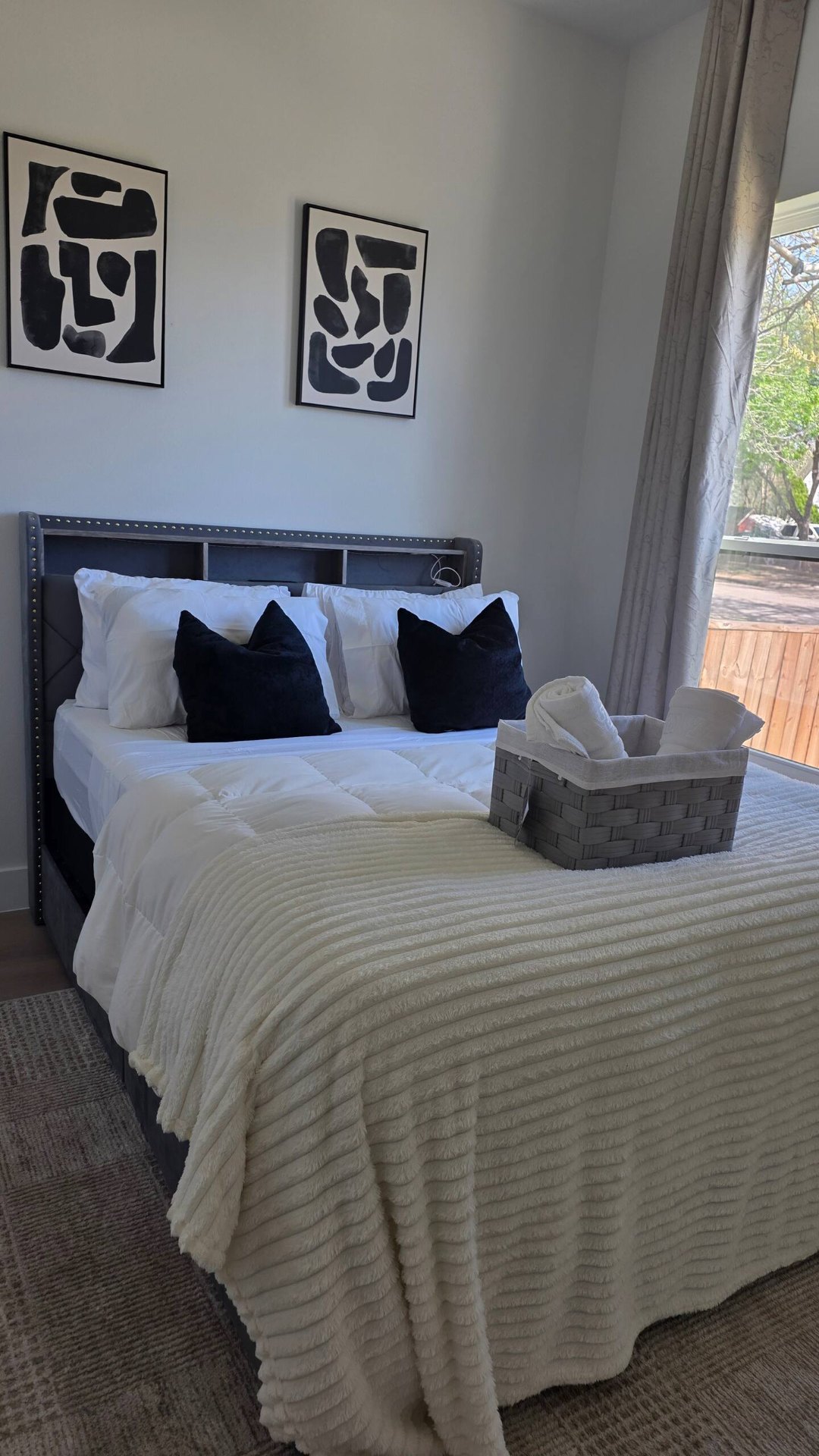 Bedroom with framed gallery wall